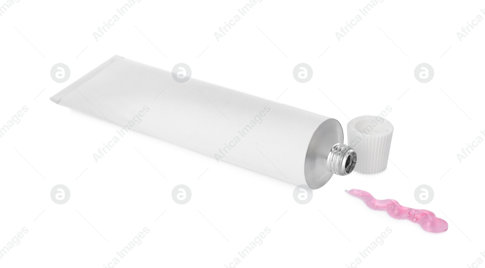 Photo of Open tube with ointment on white background