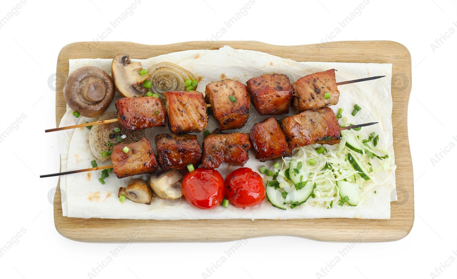 Photo of Wooden board with delicious shish kebabs, vegetables and lavash isolated on white, top view