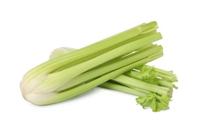 Photo of Fresh green celery bunches isolated on white