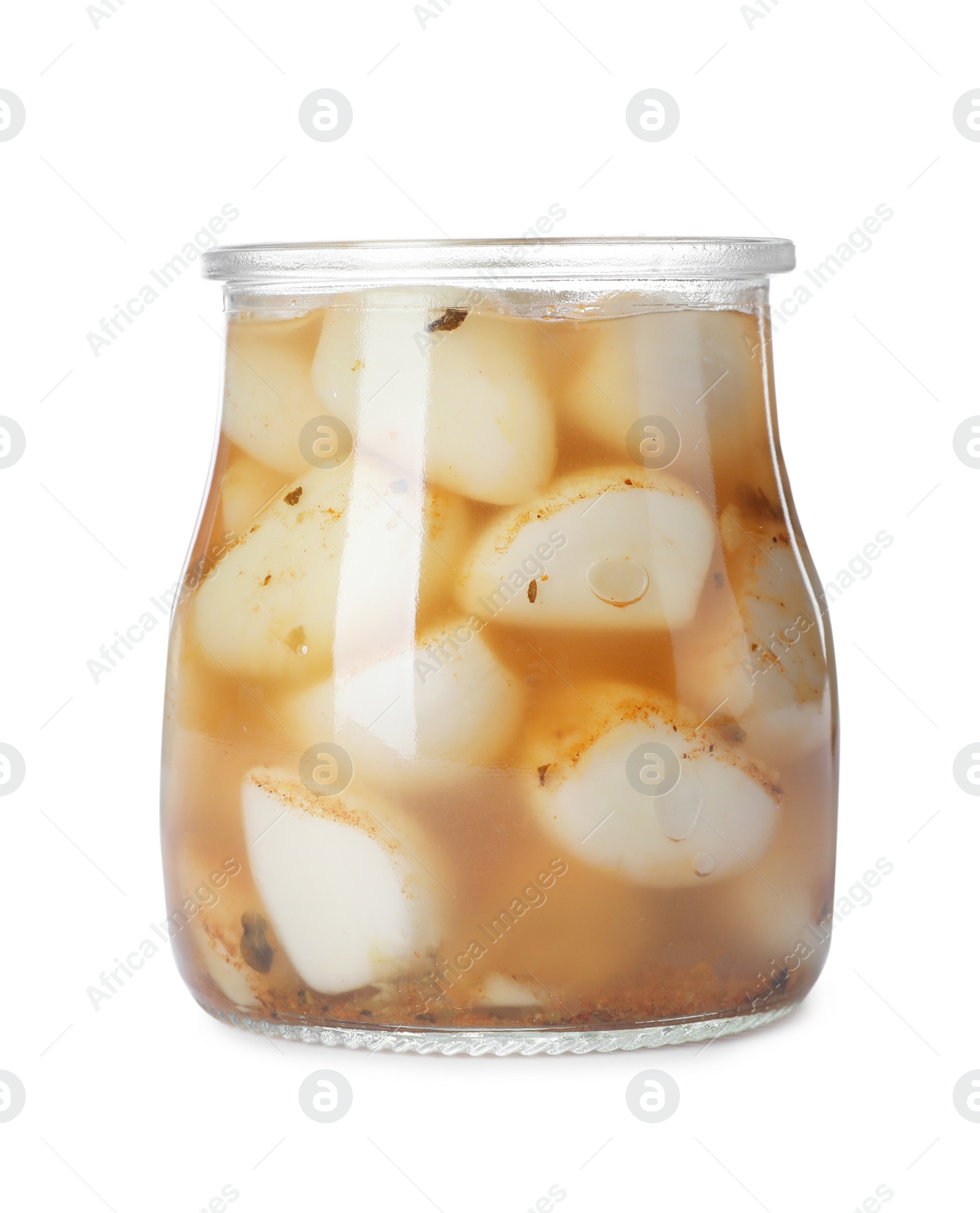 Photo of Glass jar with preserved garlic on white background