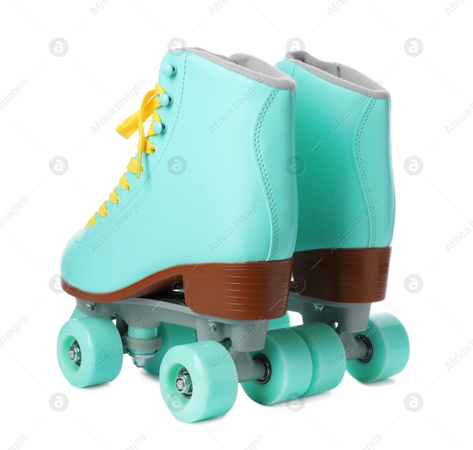 Photo of Pair of stylish quad roller skates on white background