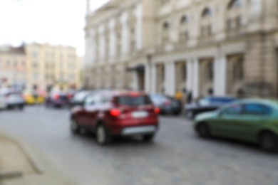 Blurred view of city street traffic with cars