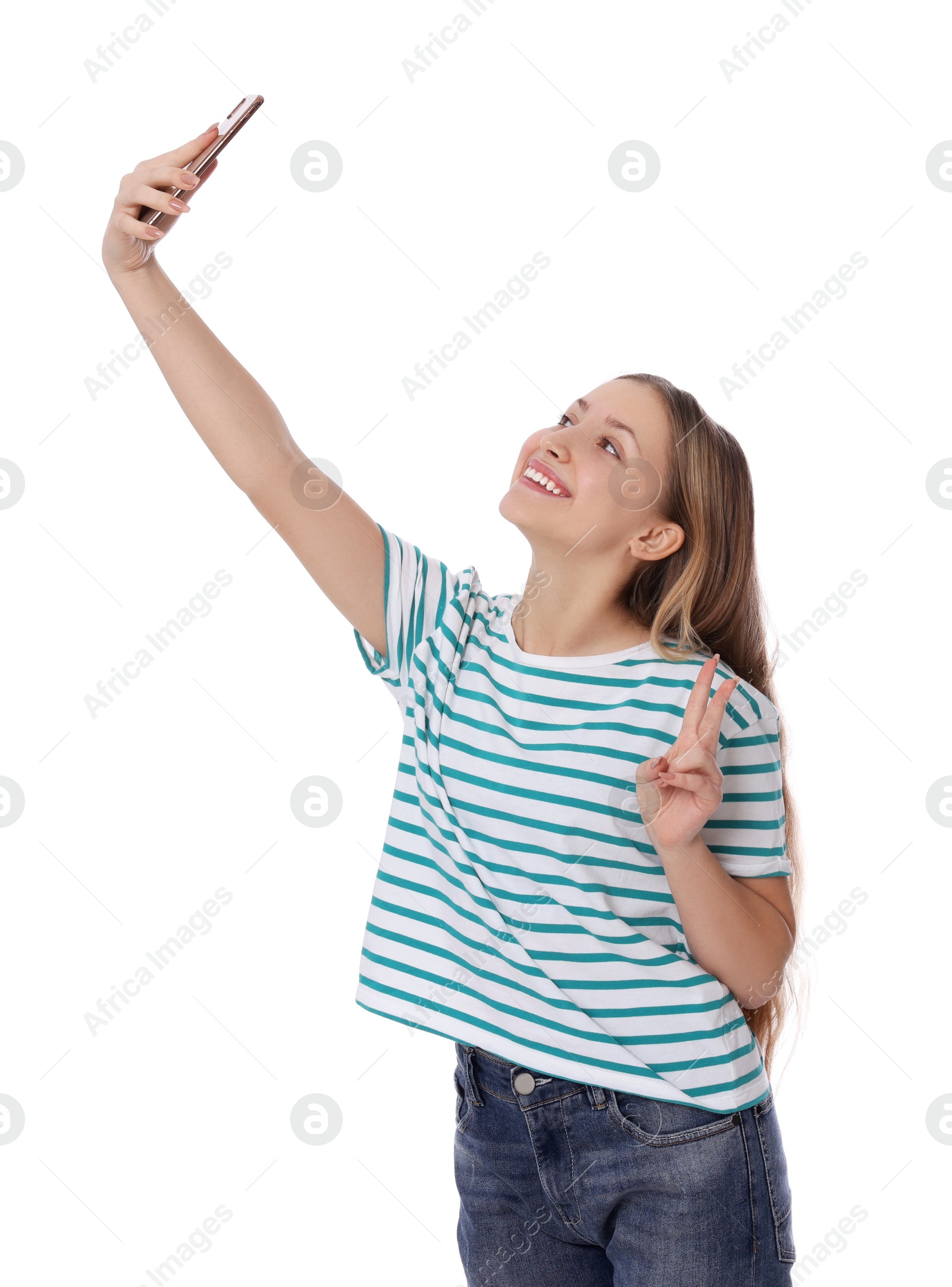 Photo of Teenage girl taking selfie on white background