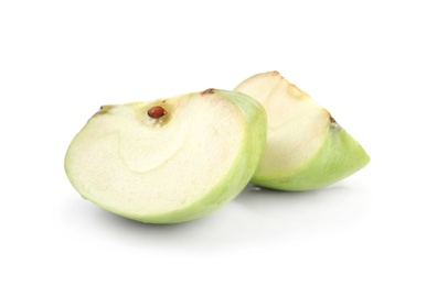 Photo of Pieces of fresh green apple on white background