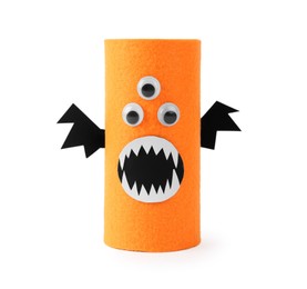 Photo of Monster made of orange felt isolated on white. Halloween decoration