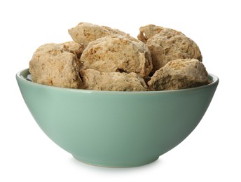 Photo of Dehydrated soy meat chunks in bowl on white background