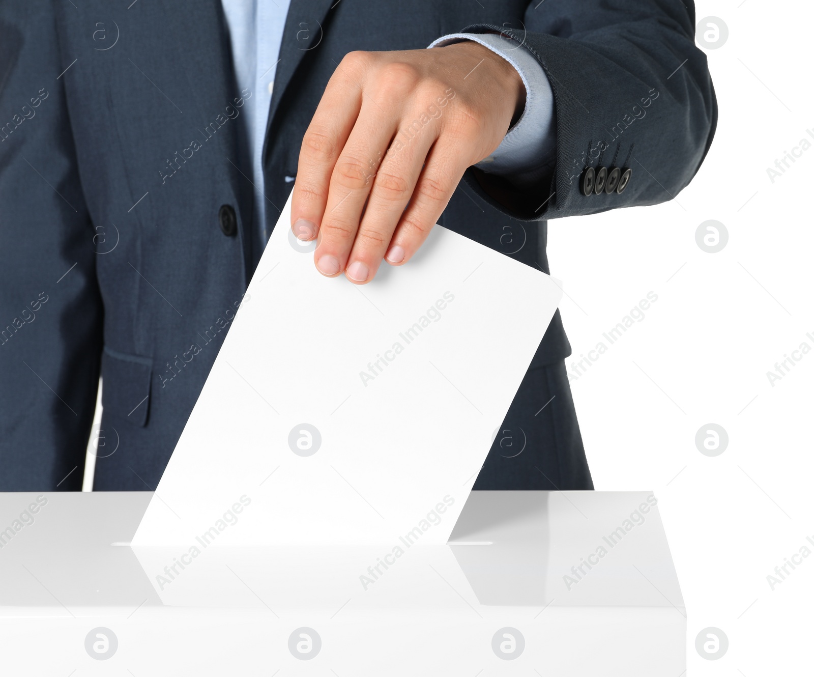 Photo of Man putting his vote into ballot box on white background, closeup