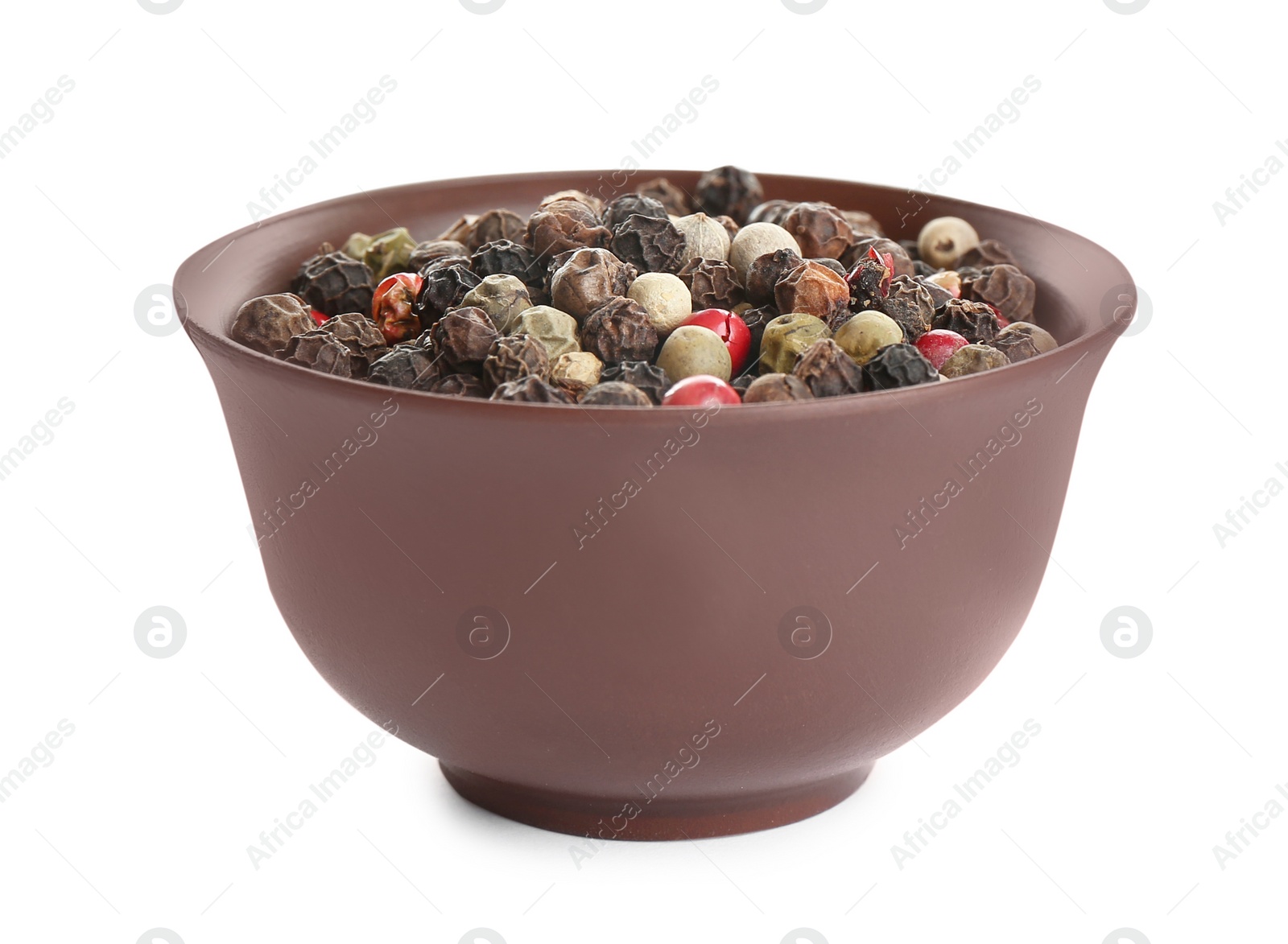 Photo of Bowl of mixed peppercorns isolated on white