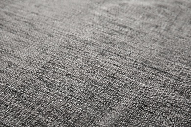 Soft warm grey plaid as background, closeup