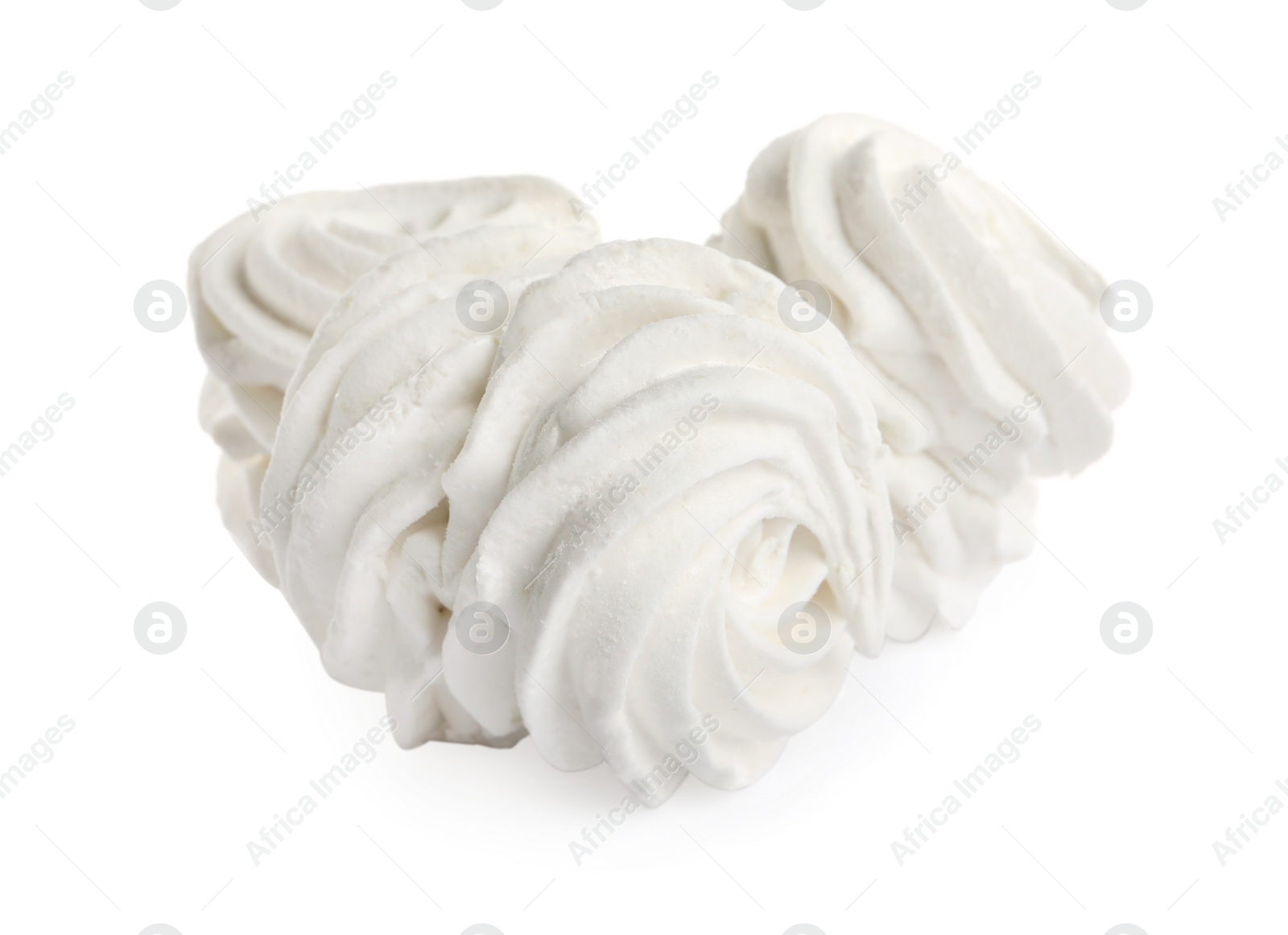 Photo of Many delicious sweet zephyrs on white background