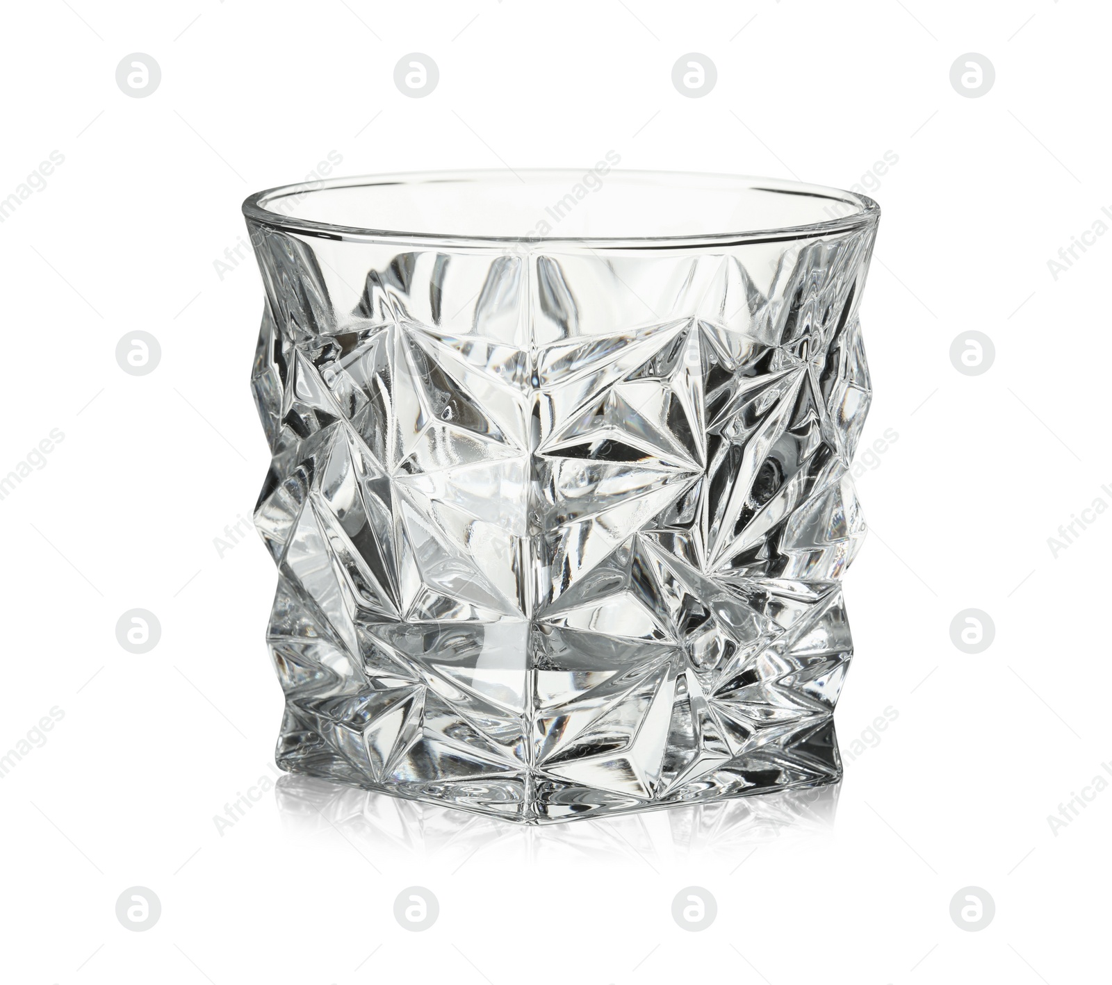 Photo of Empty glass for whiskey isolated on white