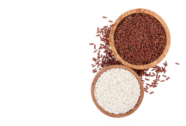 Bowls with different sorts of rice isolated on white, top view