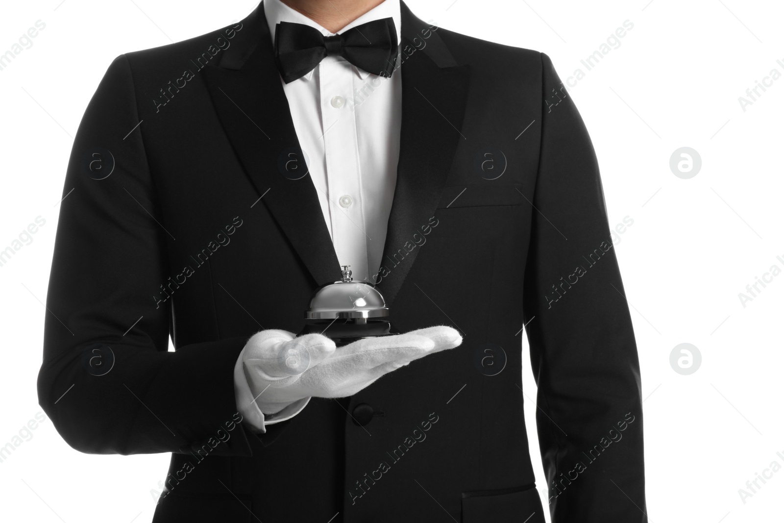 Photo of Butler holding service bell on white background, closeup