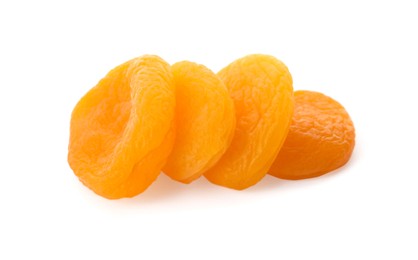 Photo of Pile of tasty apricots on white background. Dried fruits