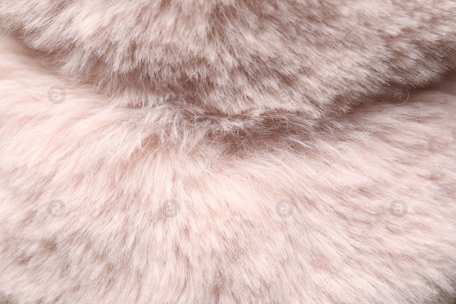 Photo of Texture of pink faux fur as background, closeup