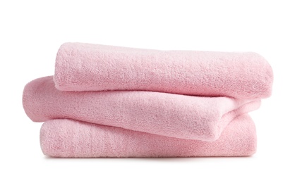 Photo of Stack of clean soft towels on white background