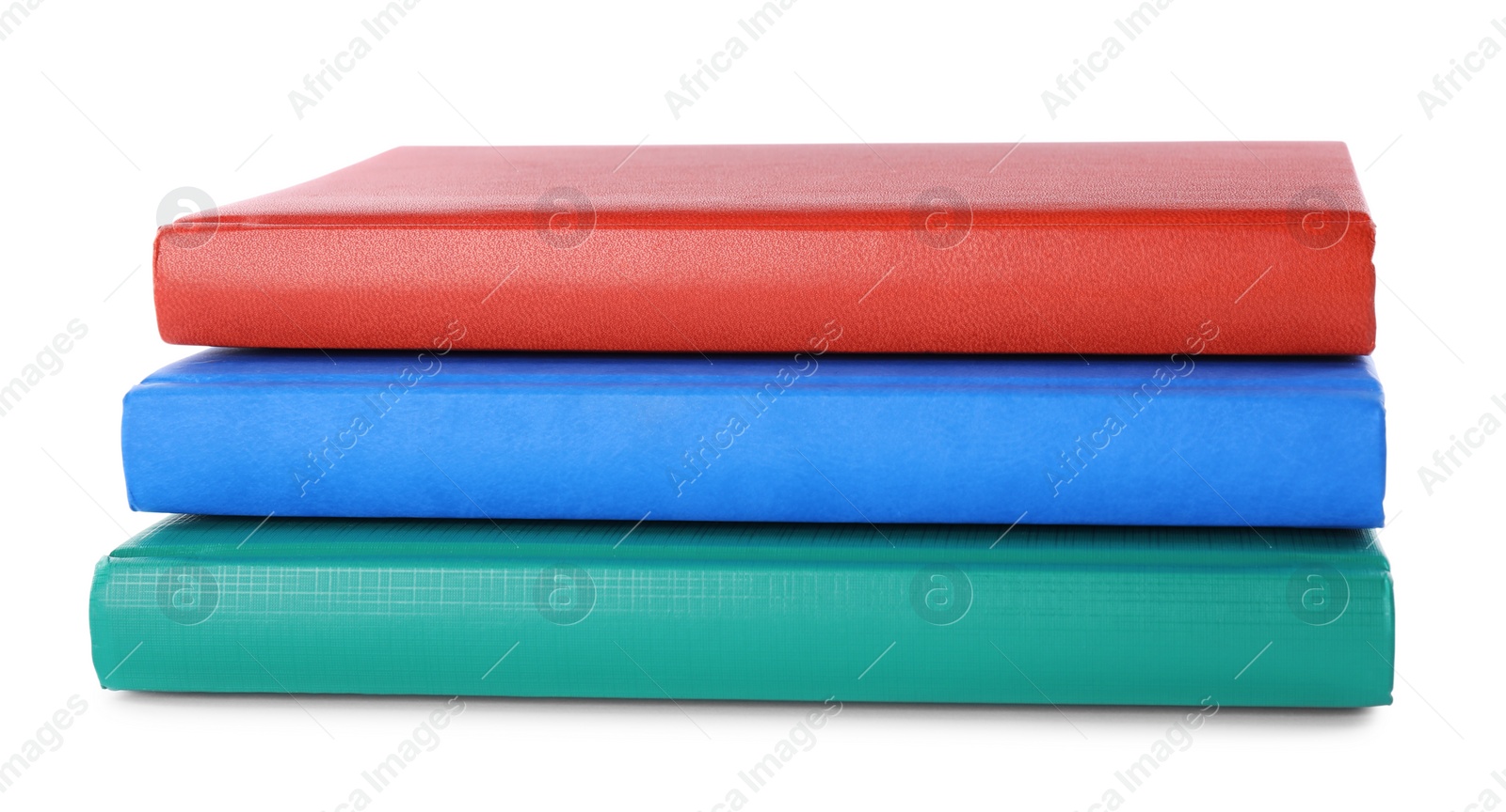 Photo of Stack of colorful notebooks isolated on white