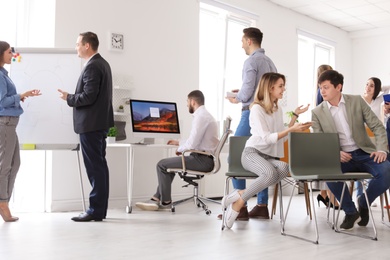 Young people having business training in office