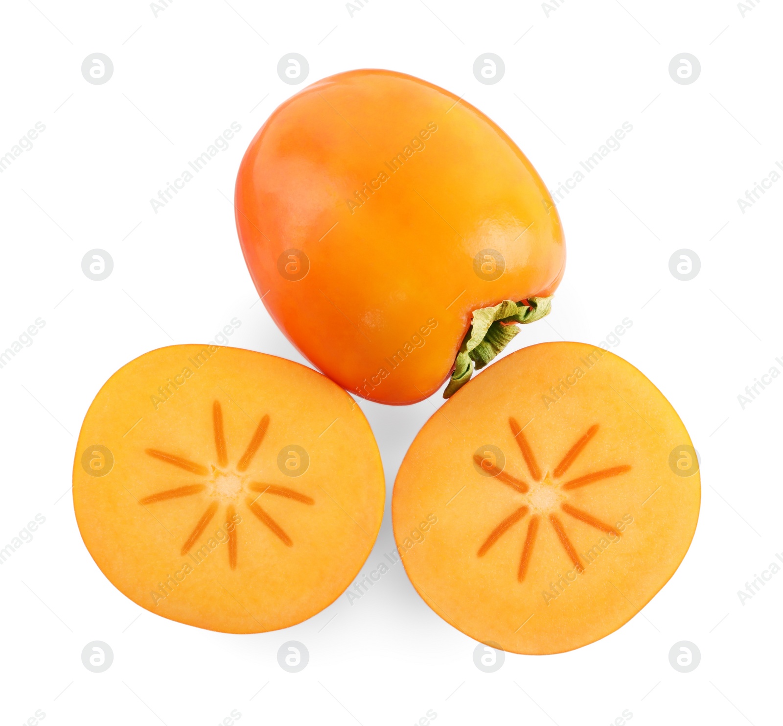 Photo of Whole and cut persimmon fruits isolated on white, top view