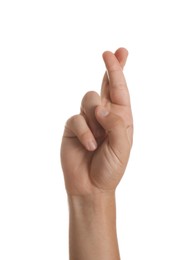 Photo of Teenage boy crossing fingers on white background, closeup