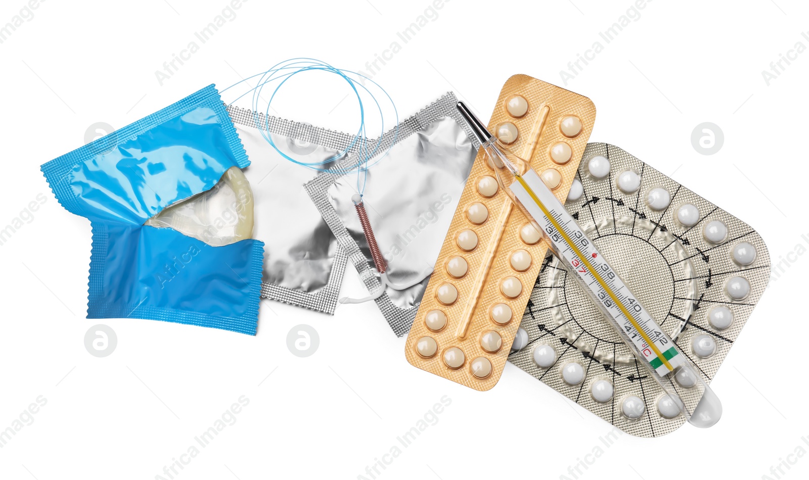 Photo of Contraceptive pills, condoms, intrauterine device and thermometer isolated on white, top view. Different birth control methods