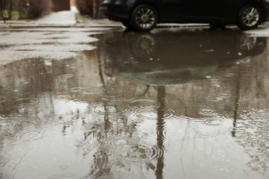 View of pouring rain on city street