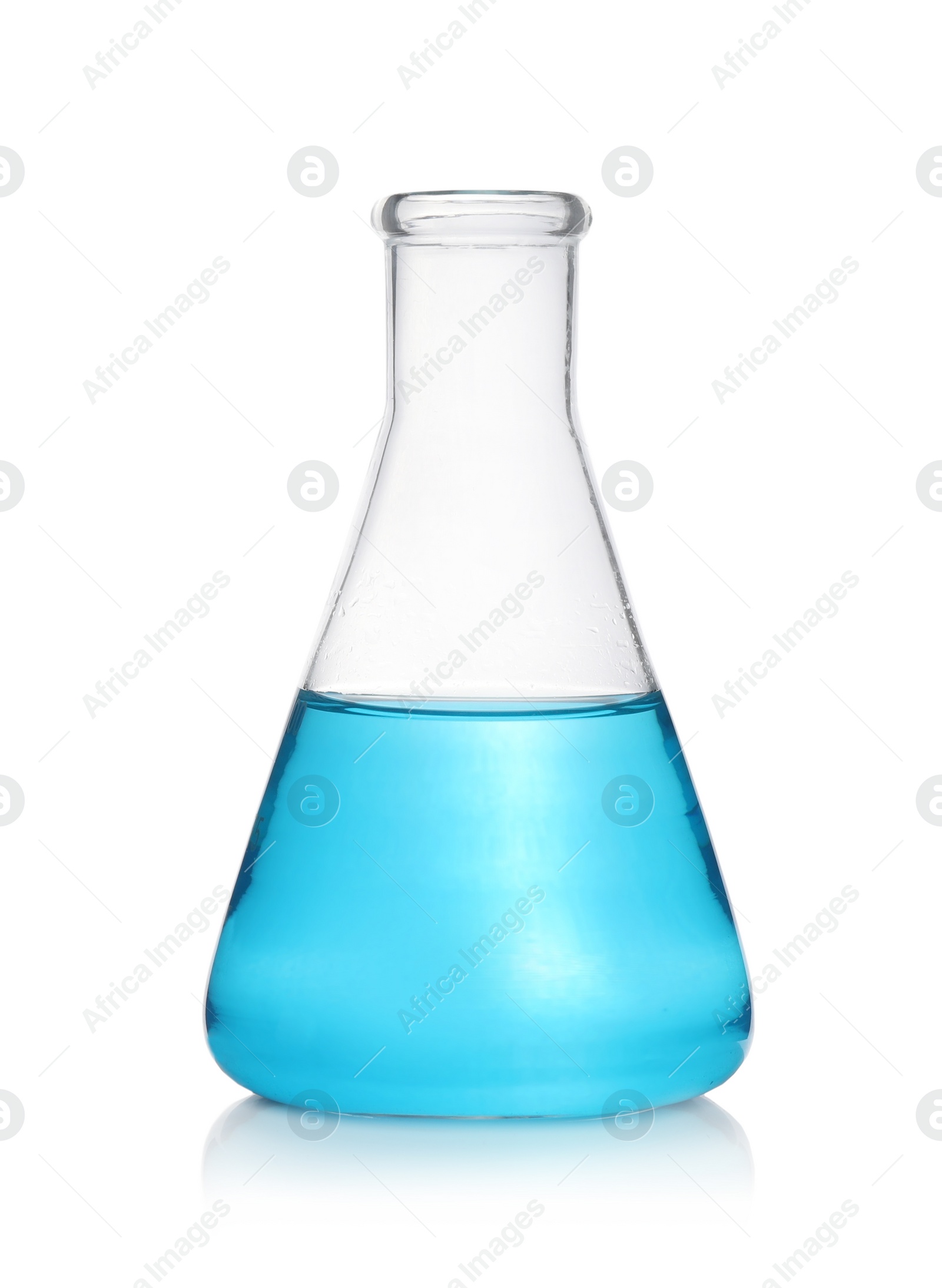 Photo of Laboratory flask with light blue liquid isolated on white