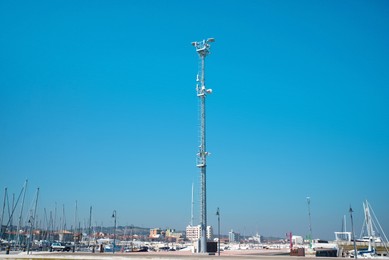 Photo of Light mast with CCTV and cellular communication system on pier