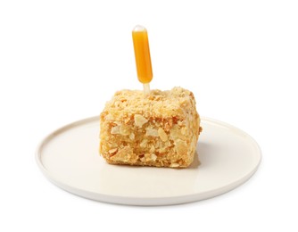 Photo of Piece of Napoleon cake with jam pipette on white background