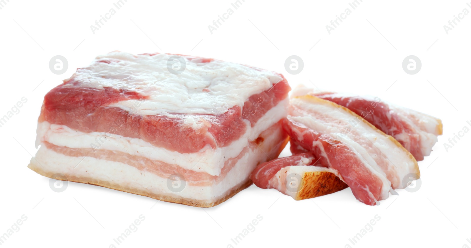 Photo of Pieces of tasty pork fatback on white background