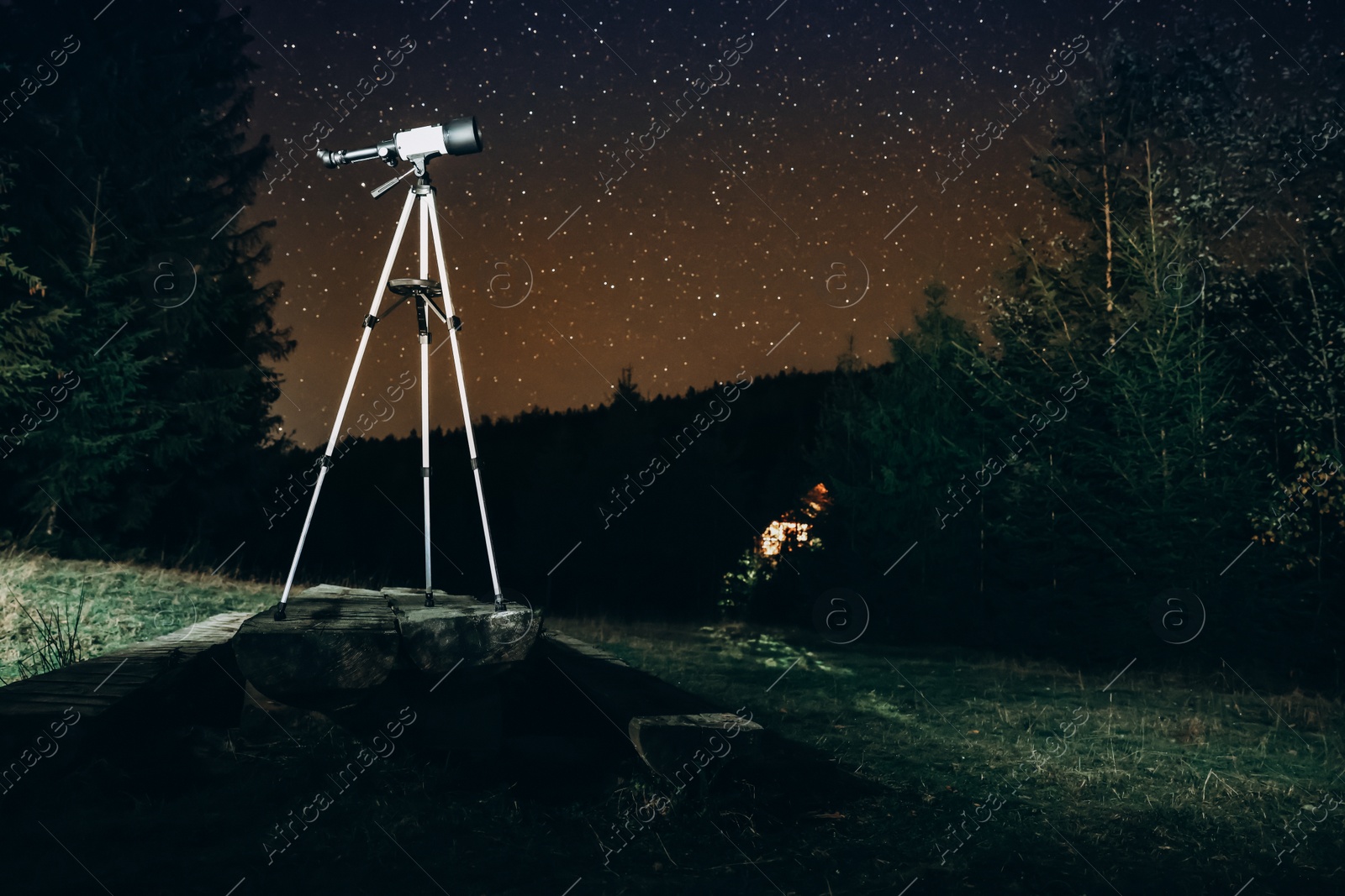 Photo of Modern telescope and beautiful sky in night outdoors. Learning astronomy