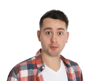 Photo of Portrait of emotional young man on white background