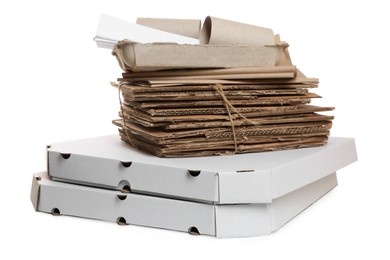 Stack of different waste paper on white background
