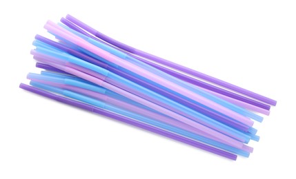 Photo of Many colorful cocktail straws on white background