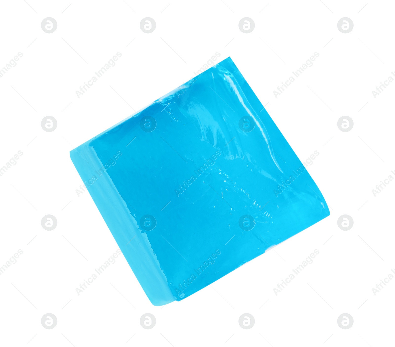 Photo of Delicious blue jelly cube on white background, top view