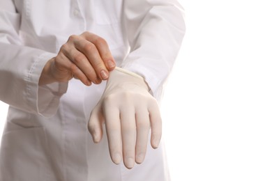 Doctor wearing medical gloves on white background, selective focus