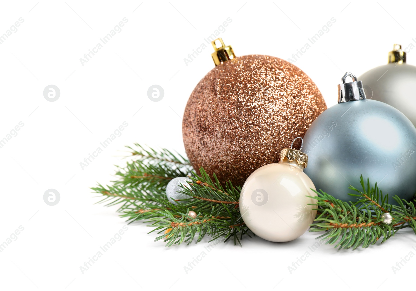 Photo of Christmas tree branches and festive decoration on white background