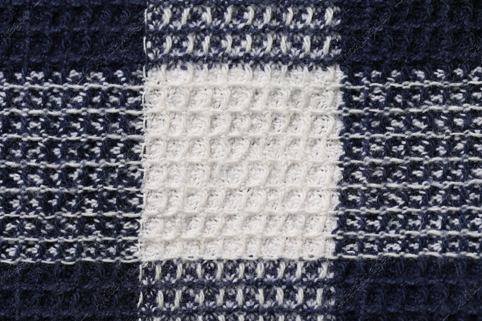 Photo of Texture of checkered fabric as background, top view