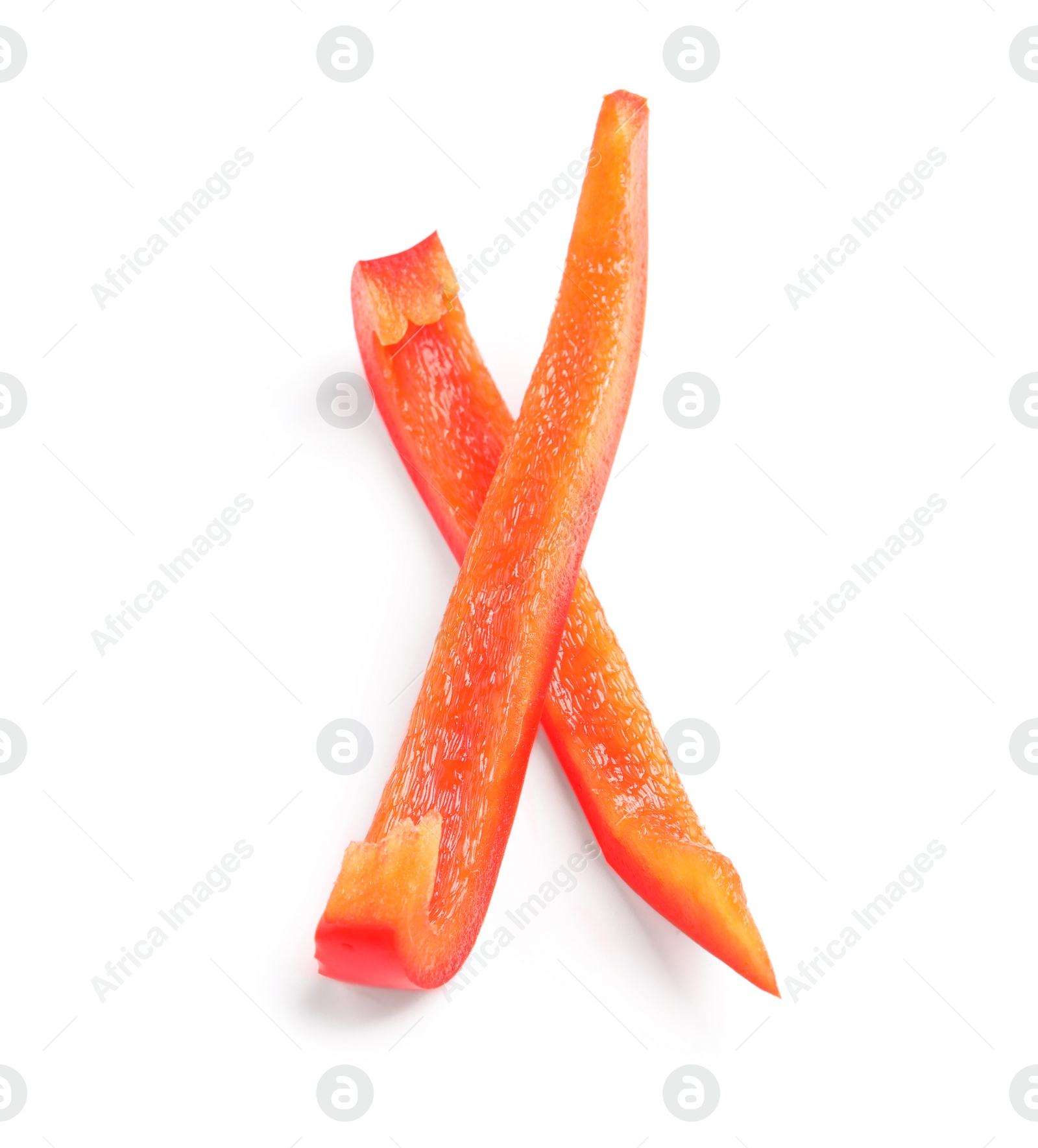 Photo of Slices of ripe red bell pepper on white background