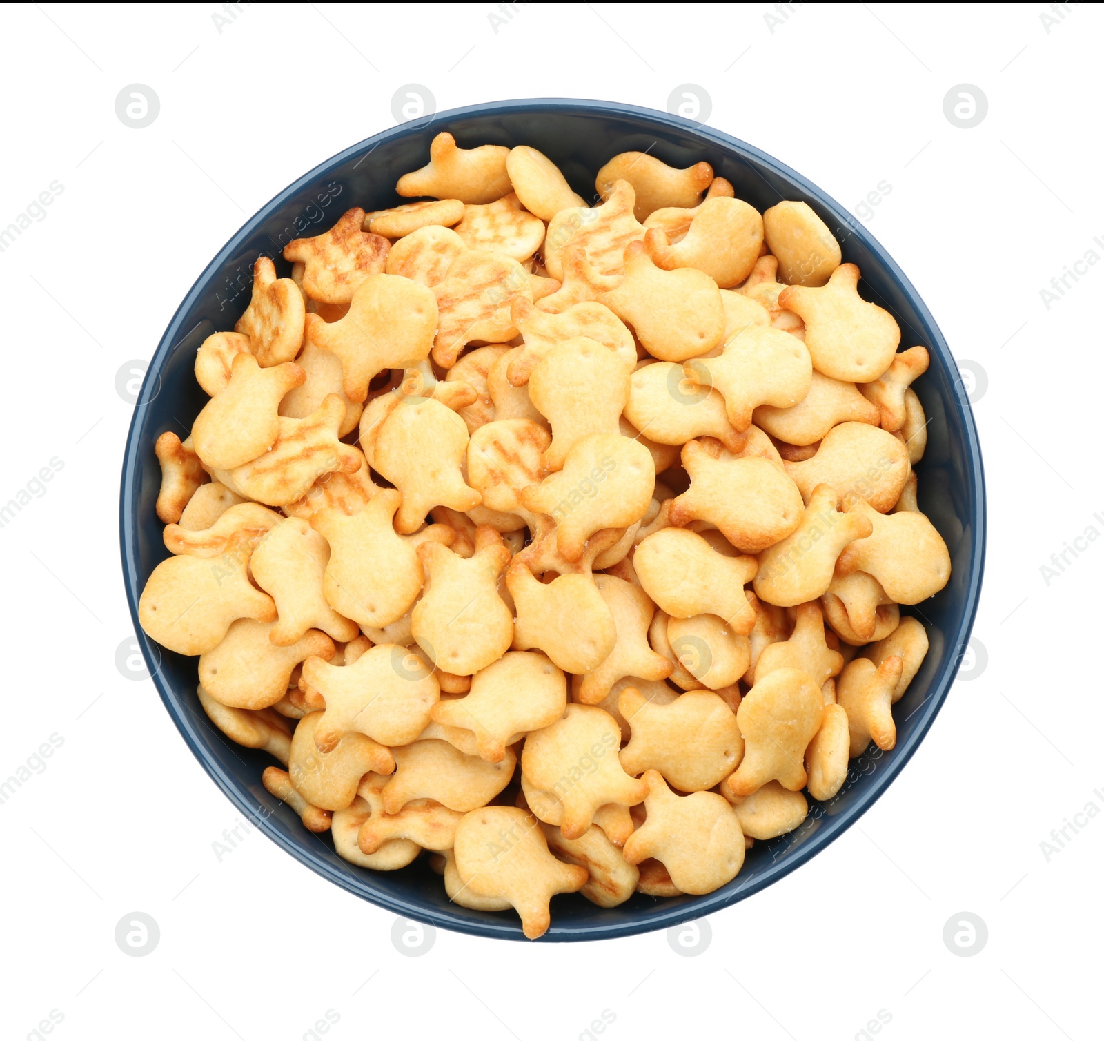 Photo of Delicious goldfish crackers in bowl isolated on white, top view