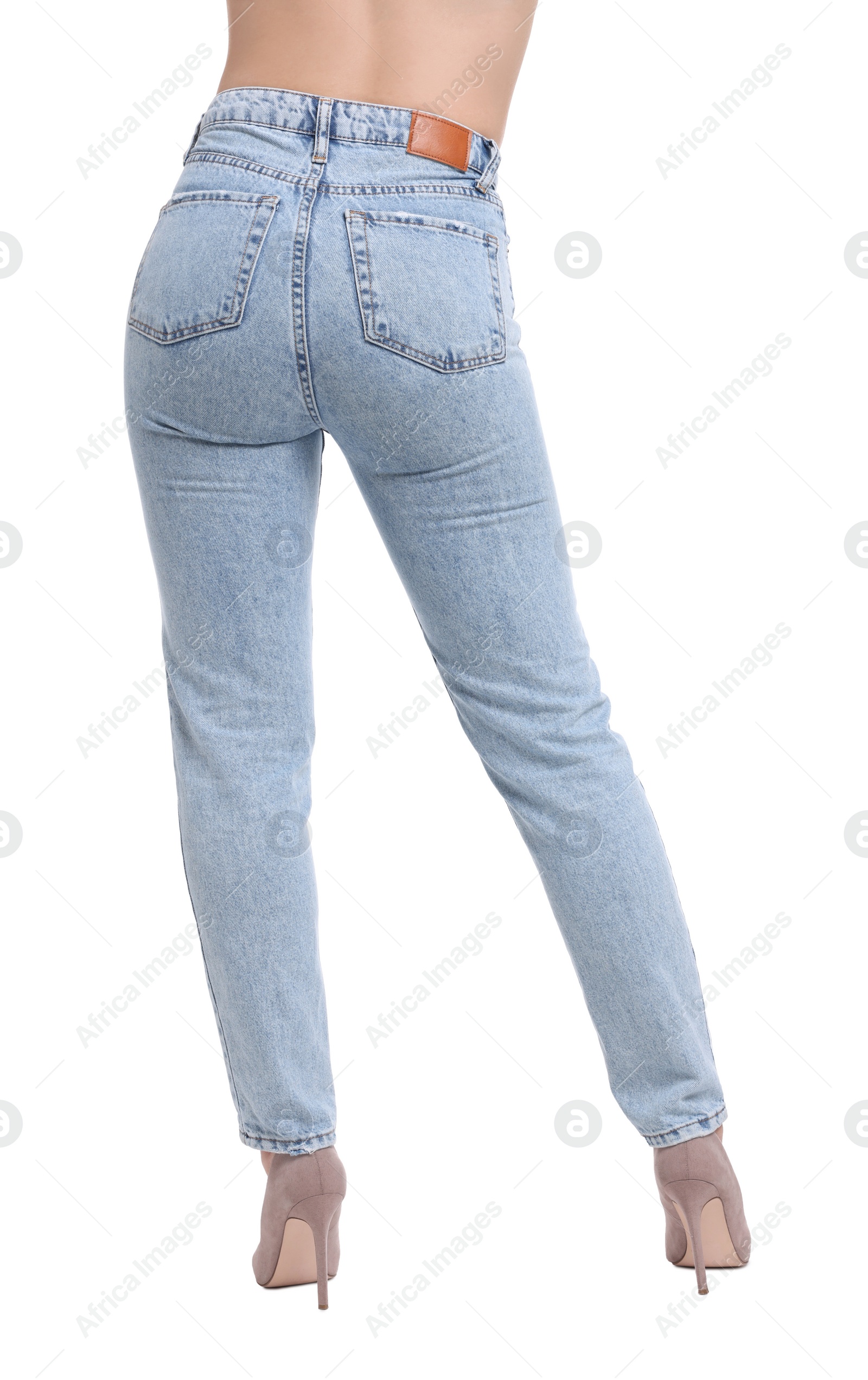 Photo of Woman in stylish jeans on white background, closeup