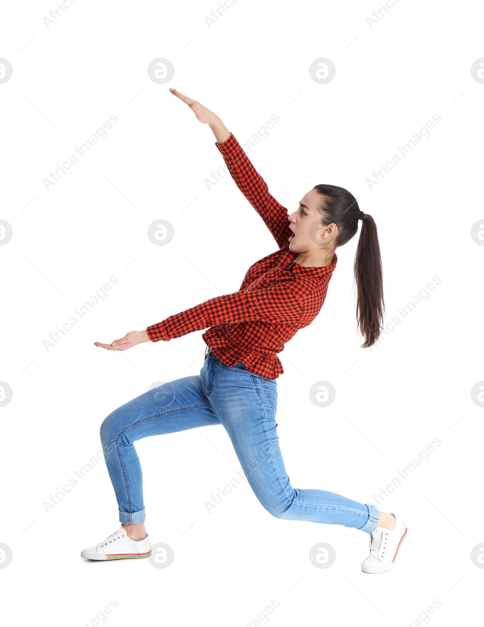 Photo of Young woman with magnet attracting people on white background