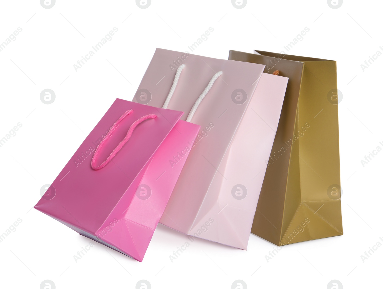 Photo of Colorful paper shopping bags isolated on white