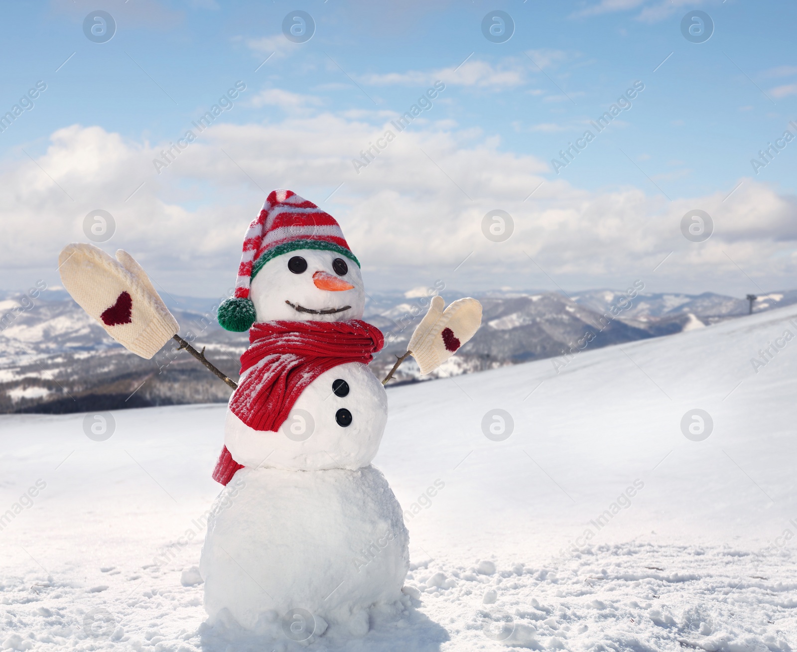 Image of Funny snowman outdoors on sunny day, space for text