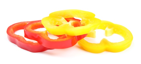 Rings of ripe bell peppers on white background