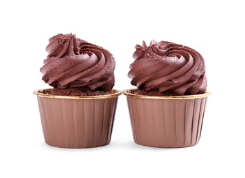 Photo of Two delicious chocolate cupcakes isolated on white