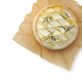 Photo of Tasty baked brie cheese with rosemary isolated on white, top view