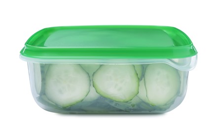 Photo of Fresh sliced cucumbers in plastic container isolated on white