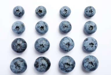 Photo of Flat lay composition with tasty blueberry on white background