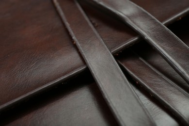 Photo of Texture of brown leather as background, closeup